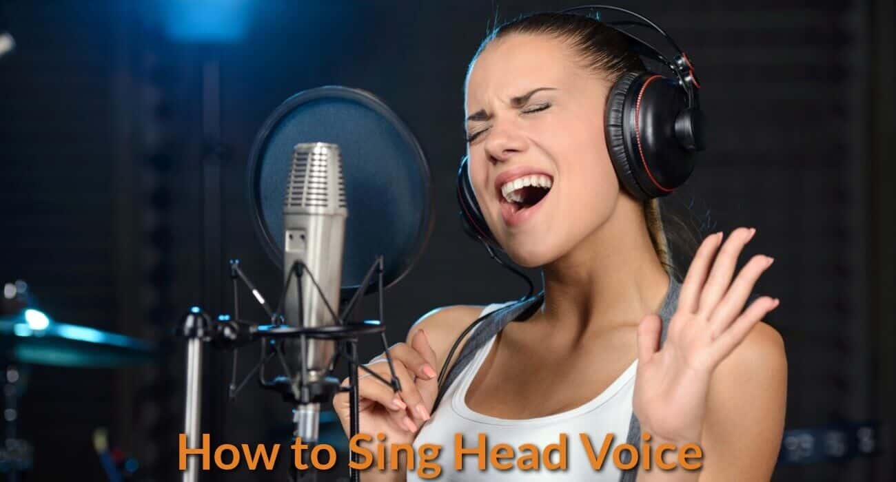 A singer is singing in high notes with her head voice in the the studio.