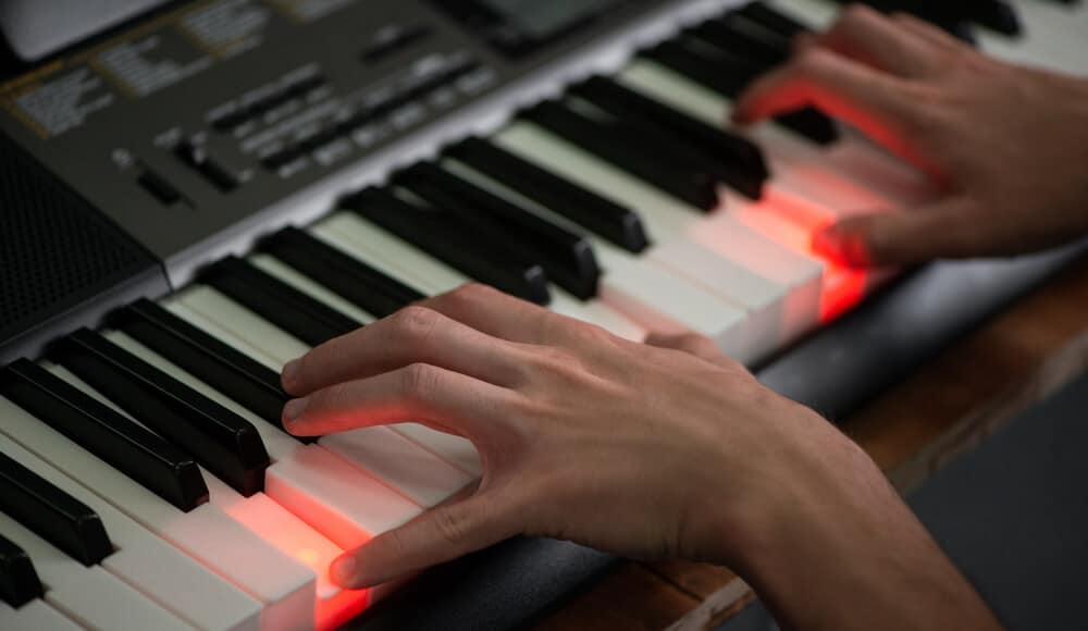 Beginner learning piano with the light-up keys keyboard.