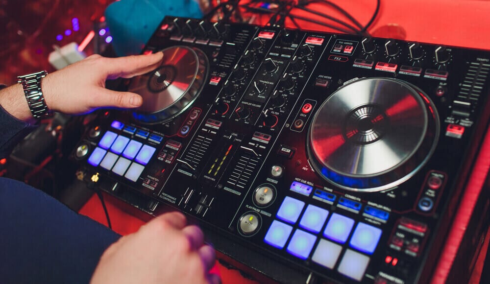 DJ making music on a DJ controller.